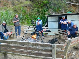 Battered Fish Cooking over the Fire